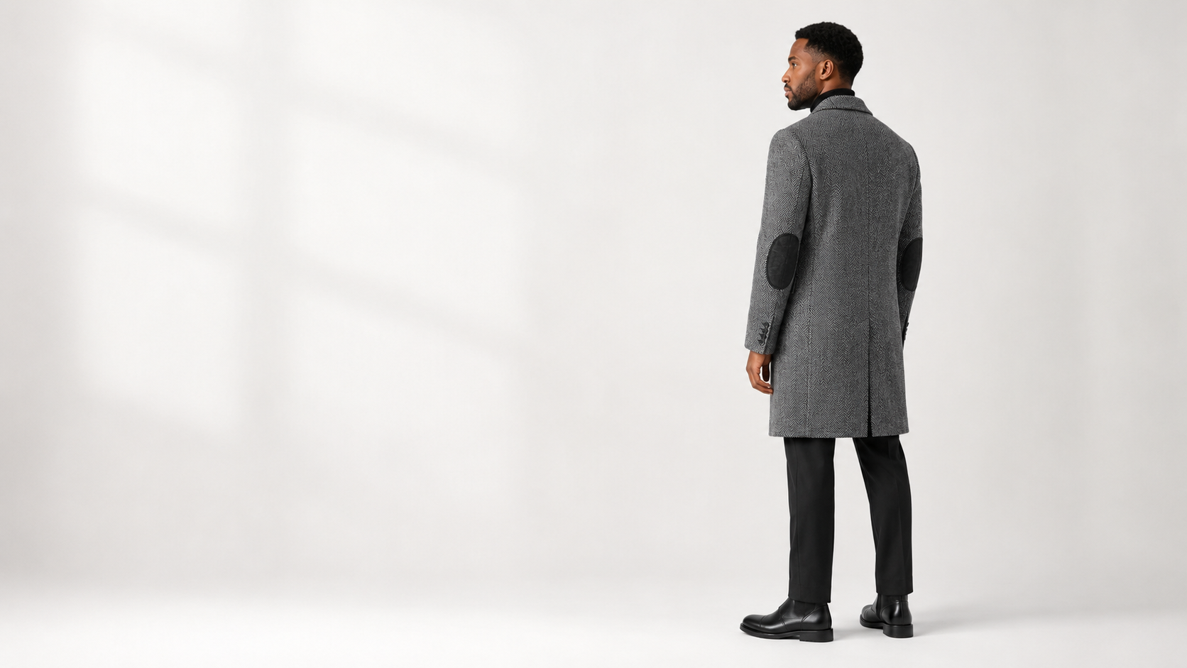 Grey herringbone overcoat, back view