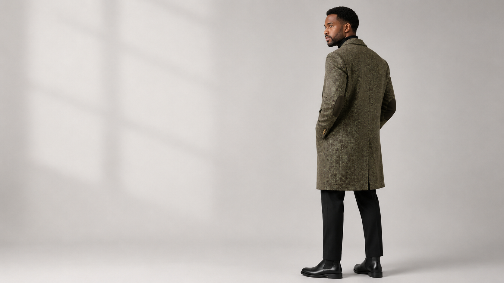 Olive herringbone overcoat, back view
